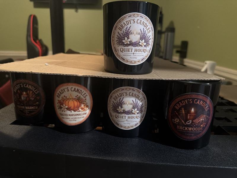 A batch of finished Brady's Candles with their round labels